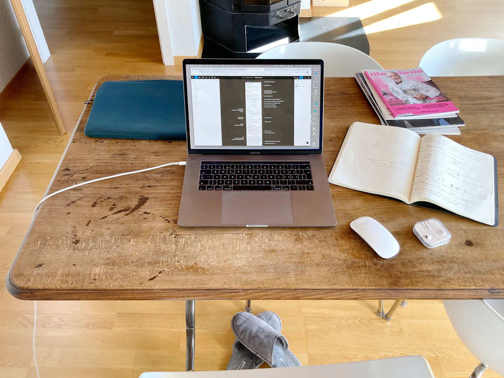 Sven's cozy home office situation with slippers and fireplace.
